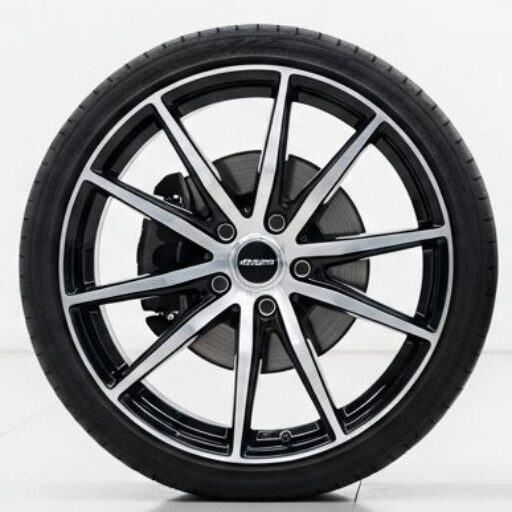 OEM car wheel next to aftermarket rim on white background